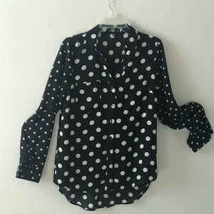 Black and white polka dot blouse.